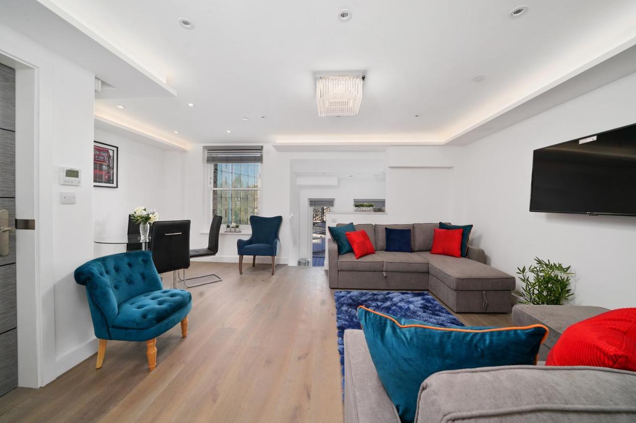 City Prime Apartments Londra Exterior foto A living room in a serviced apartment in London