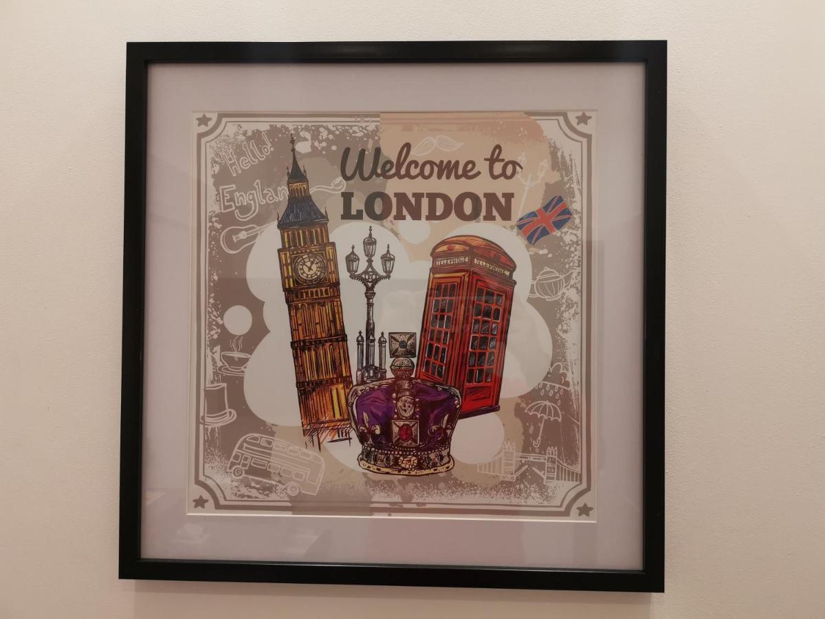 City Prime Apartments Londra Exterior foto A souvenir from London