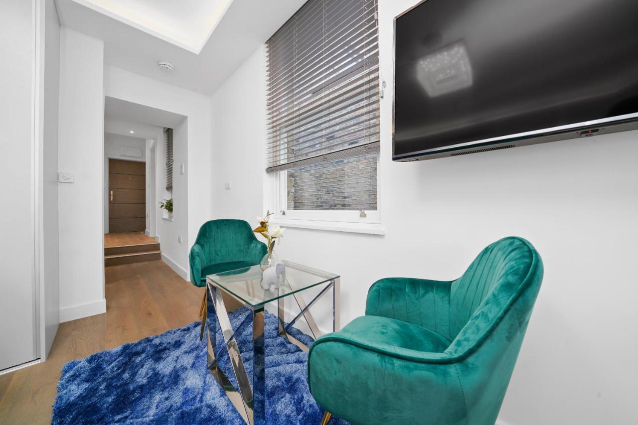City Prime Apartments Londra Exterior foto A staged photo of a living room